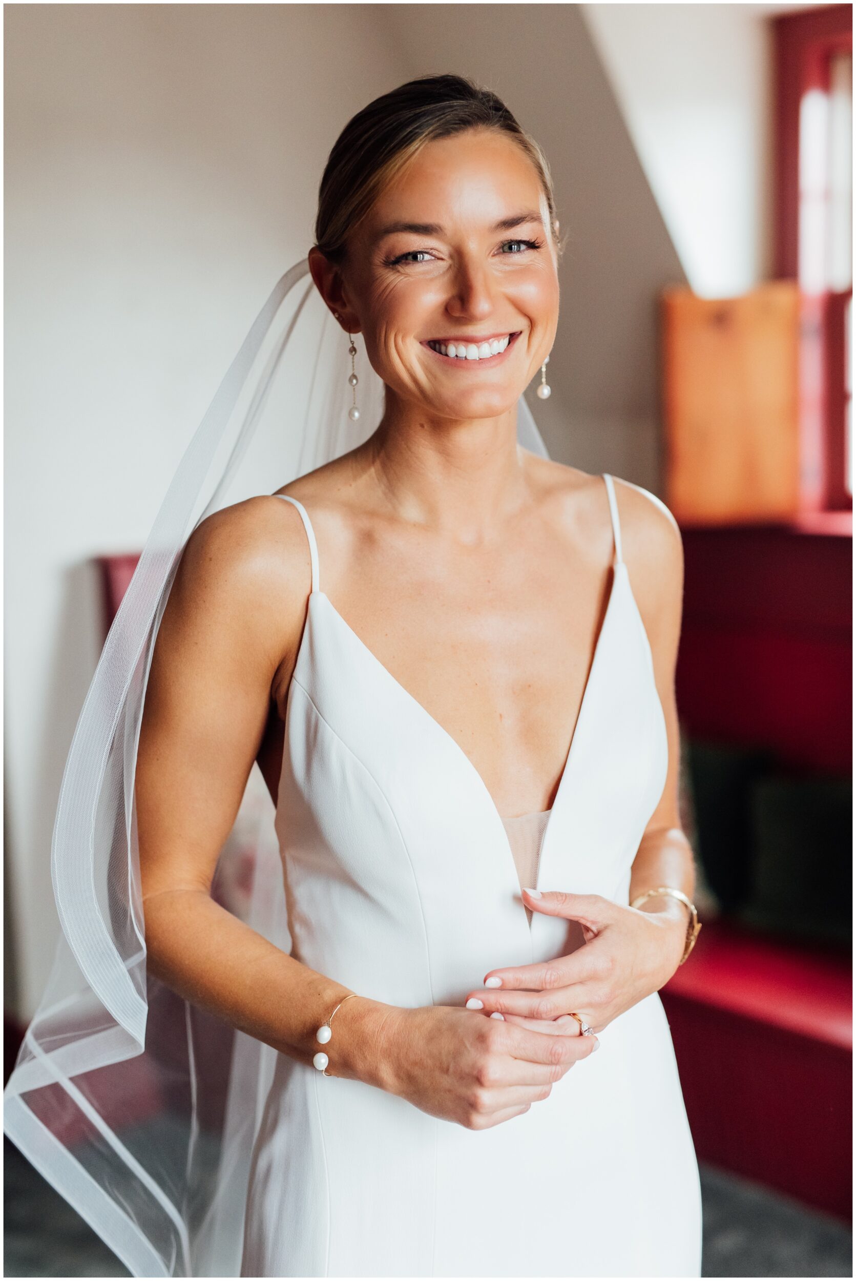 Bride portrait getting ready at Red Lion Inn winter wedding in Cohasset MA